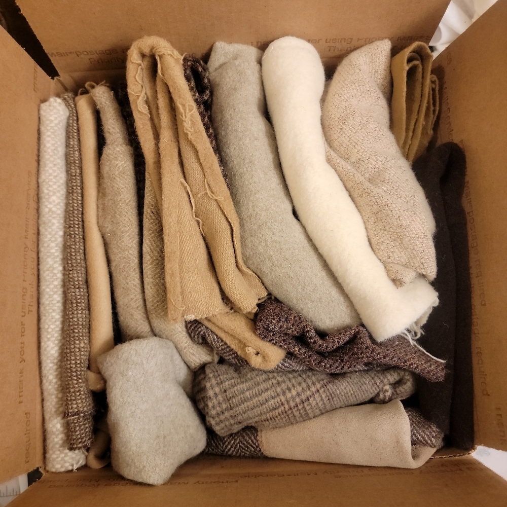 Scrap wool for arts and crafts, rug making, browns and creams.